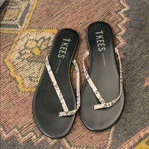 TKEE’s snakeskin flip flops size 7